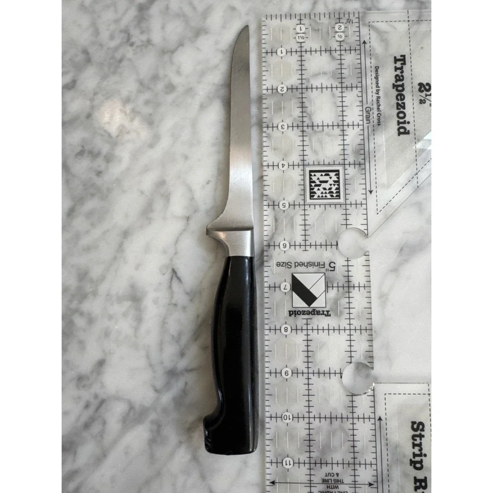 J.A. Henckels Four Star 5.5 inch Forged Boning Knife Black Handle Germany